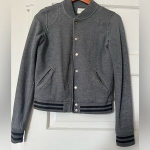 Grey jacket. As shown in pictures.